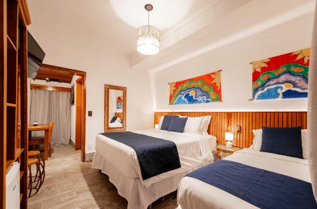 Hotel Village na Praia da Enseada em Ubatuba